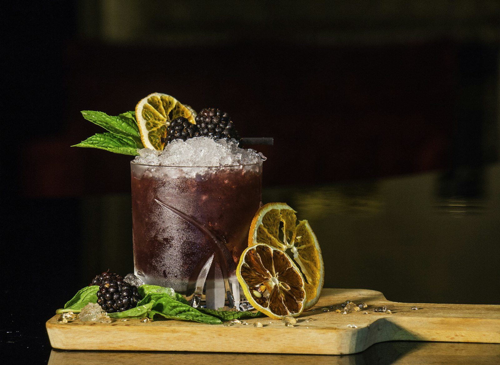 A cocktail in moody light — a city bar at night