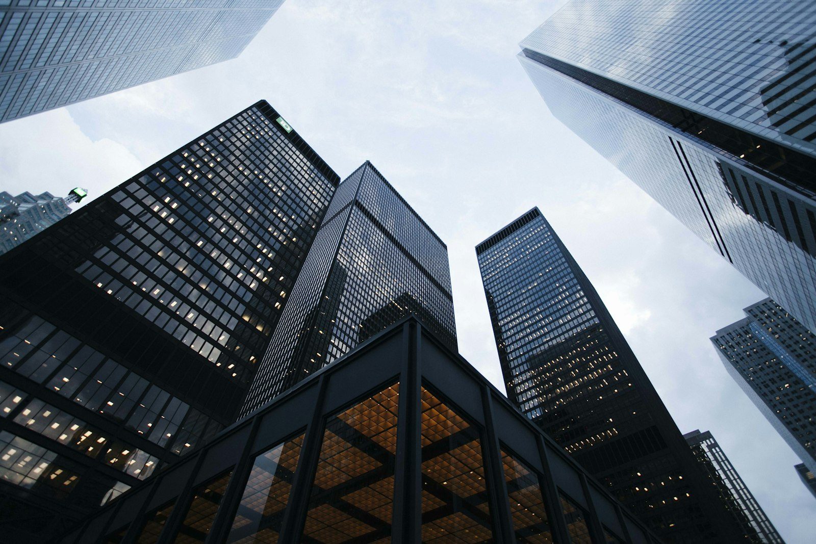 A modern glass tower, looking up